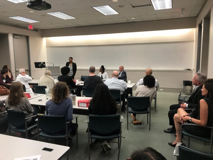 Faculty, trainees, students discussing with panelists regarding the documentary film "13th" by Ava DuVernay.