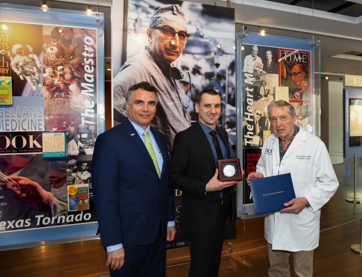 Dr. Marco Sardiello (middle) with Drs. Adam Kuspa (left) and George Noon (right).