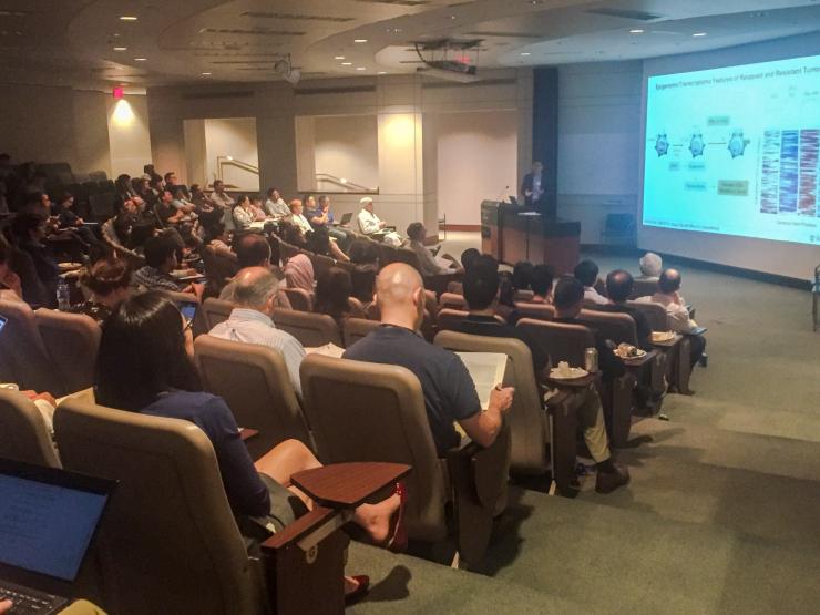 Dr. Andy Minn giving his talk on on how interferon signaling and activation of pattern recognition receptors not only can enhance cancer immunotherapy but also limit response, resulting in resistance.
